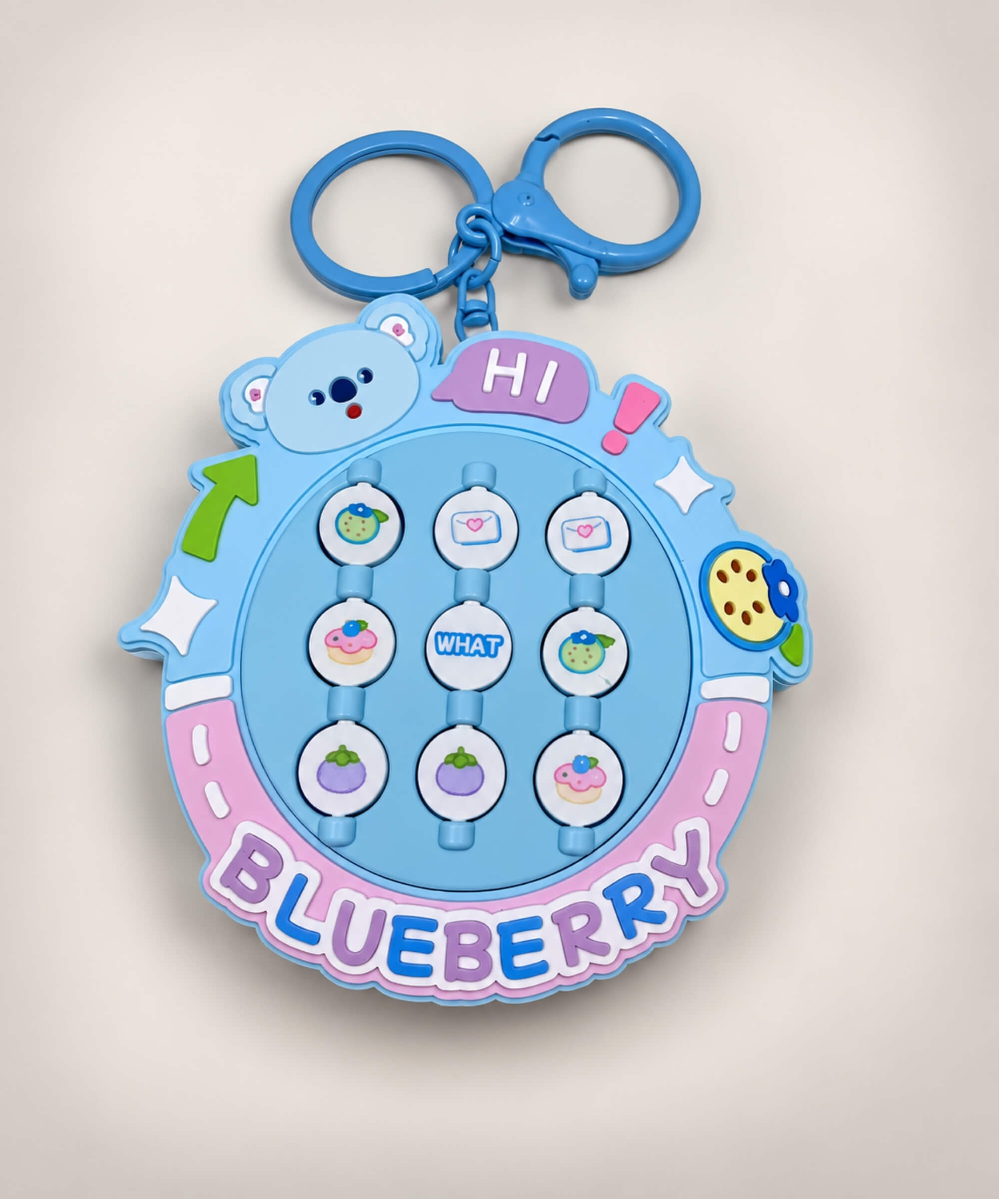 Blueberry Flip Matching Game Keychain with nine rotating picture tiles